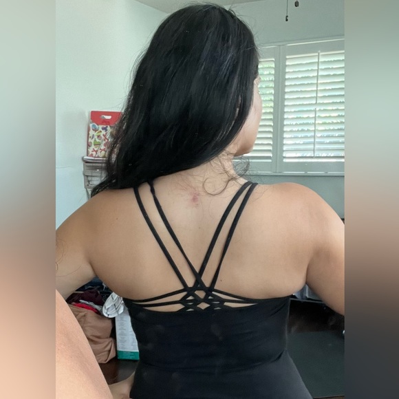 Lululemon black top, criss-cross back size 6. Just too small for me now. Used . - Picture 6 of 6